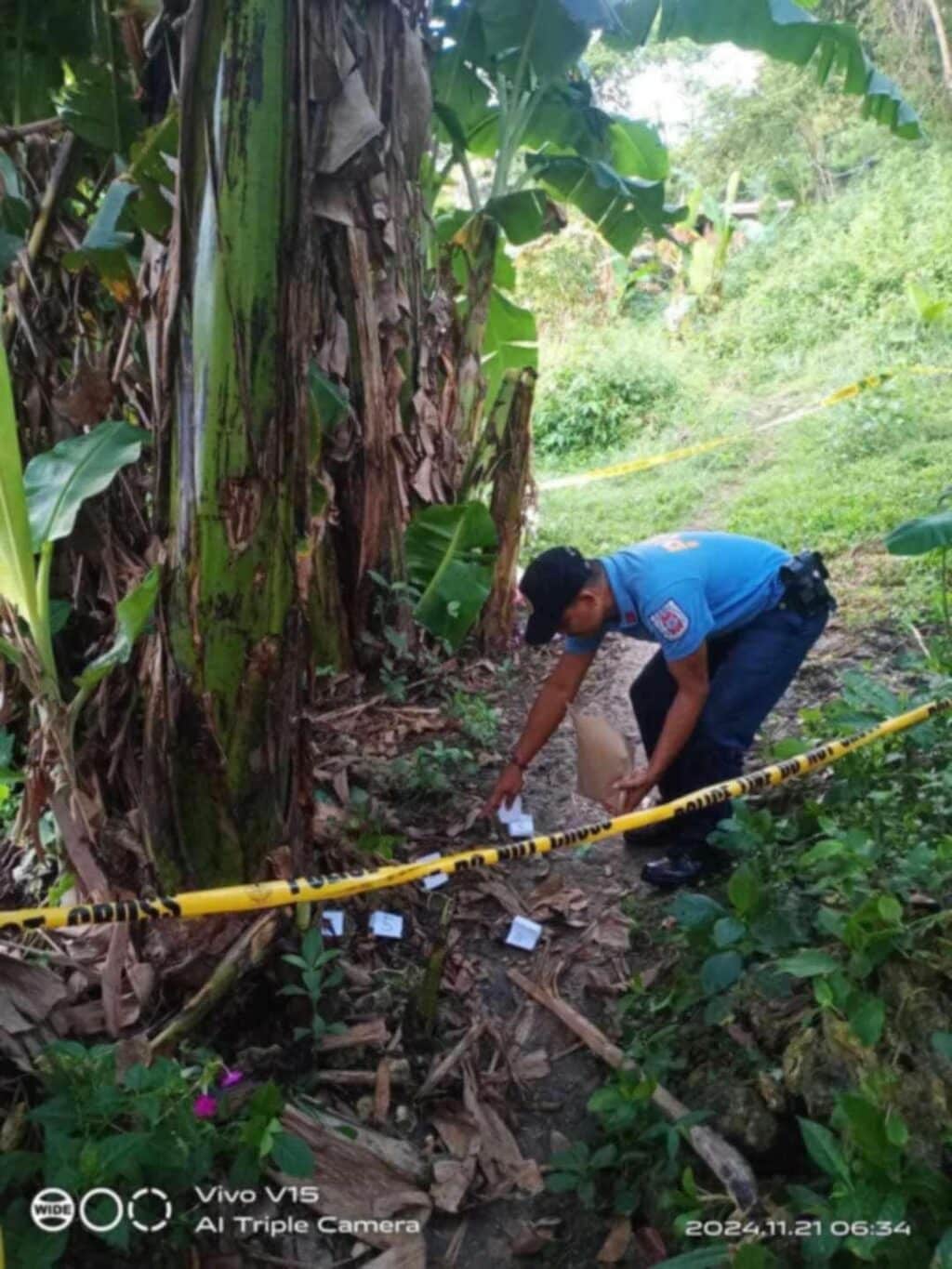 A member of the Scene of the Crime Operative of the police process the crime scene where an elderly woman was shot and killed while her husband was wounded. | Contributed photo via Paul Lauro