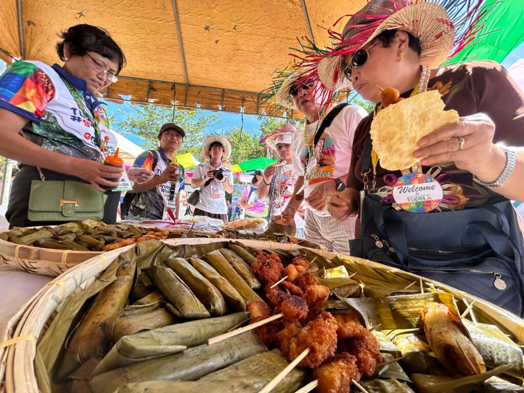 Delegates of Suroy-Suroy Sugbo’s Camotes leg last May 2024 enjoyed various delicacies offered by the locals of the Municipality of Tudela.| Photo by Niña Mae Oliverio