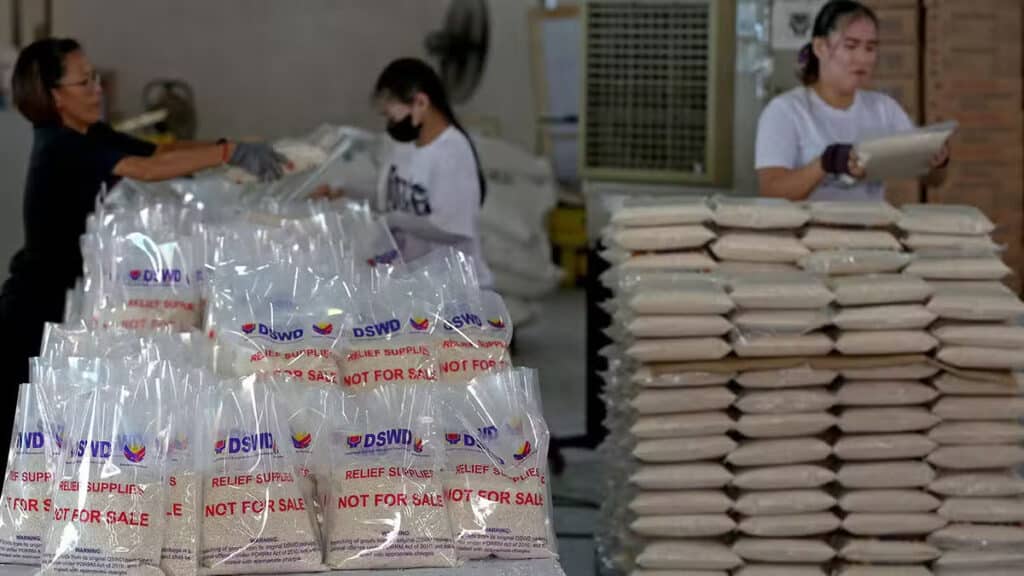 Aftermath of 3 typhoons: P500M in damage, 600,000 displaced. RELIEF PACKS COMING Government employees and volunteers work double time to repack rice and other food supplies at the Department of Social Welfare and Development warehouse in Pasay City so these can be delivered to areas devastated by successive typhoons this month. —Richard A. Reyes