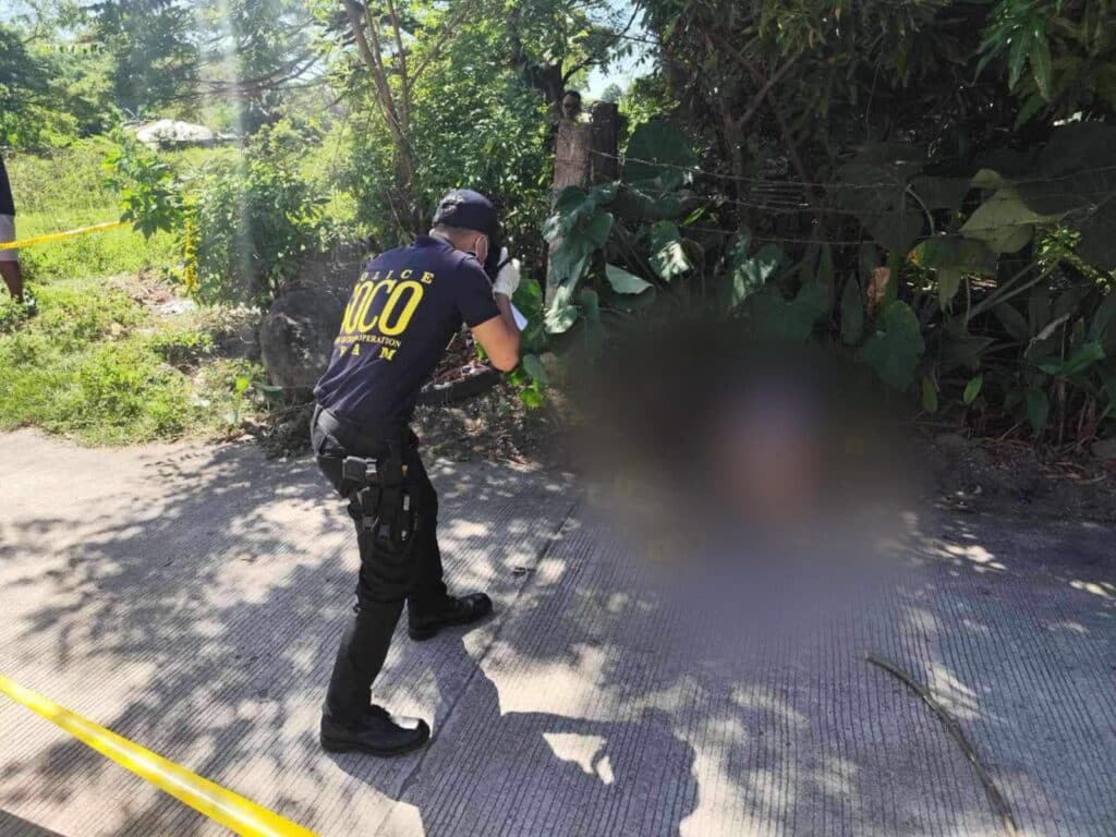 Father kills self after shooting dead his 2 kids in Negros Oriental. A policeman of the Scene of the Crime Operative process the crime scene in Barangay Buntis, Bacong town in Negros Oriental on December 5. | Contributed photo via Futch Anthony Inso