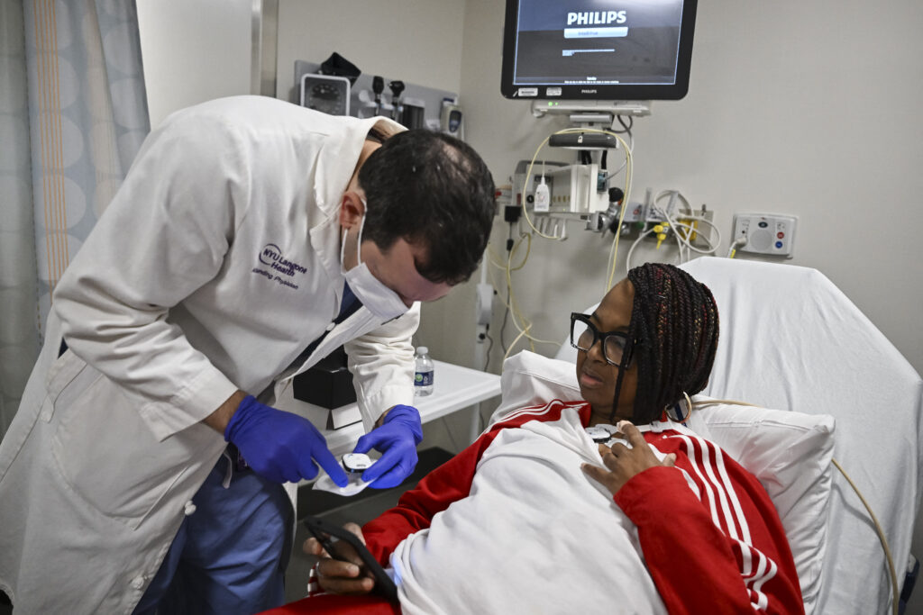 Towana Looney, 53, who received a gene-edited pig kidney, undergoes medical testing with Dr. Jeffrey Stern, MD at NYU Langone Health on December 11, 2024 in New York. | Photo by ANGELA WEISS / AFP