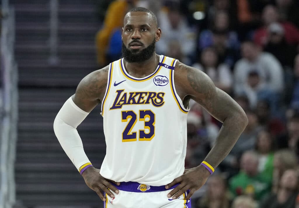 LeBron James #23 of the Los Angeles Lakers looks on against the Golden State Warriors during the first half at Chase Center on December 25, 2024 in San Francisco, California. | Thearon W. Henderson/Getty Images/AFP