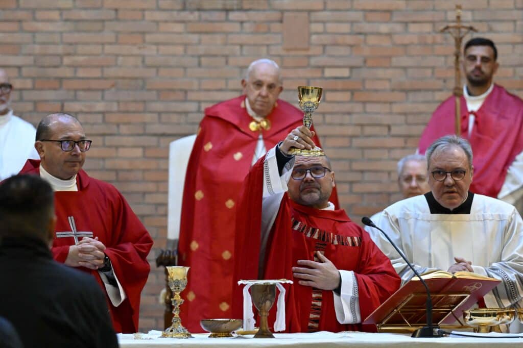 This photo taken and handout on December 26, 2024 by The Vatican Media shows Pope Francis during a mass after the opening of a Holy Door at Rebibbia Penitentiary on Saint Stephen day in Rome as part of the Catholic Jubilee Year. | Photo by Handout / VATICAN MEDIA / AFP