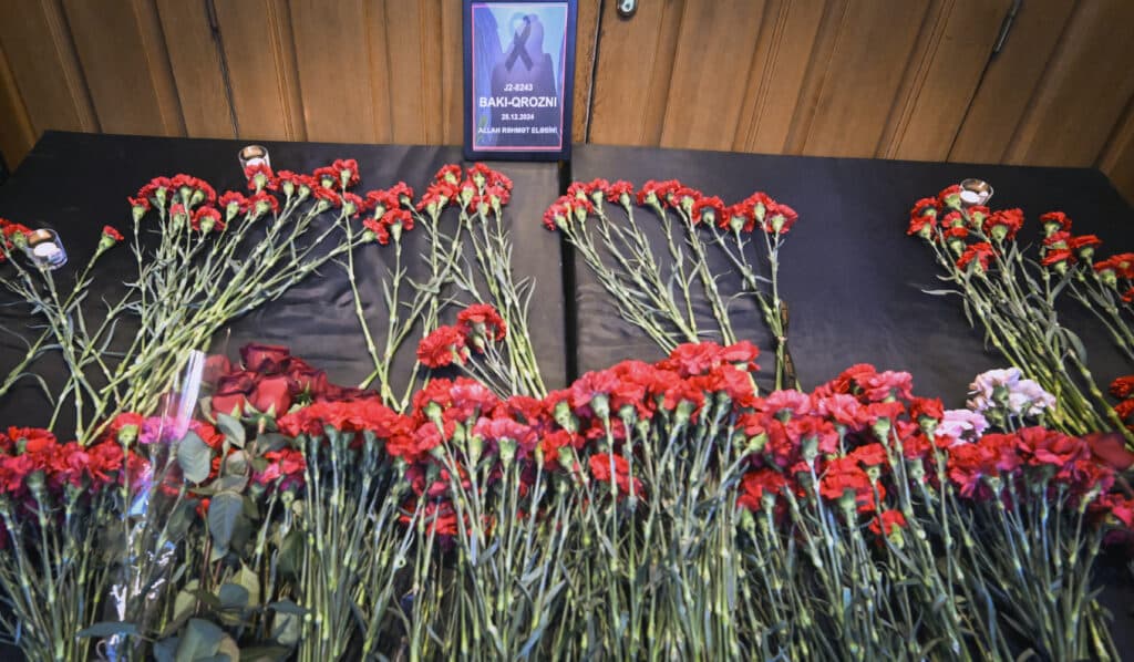 Azerbaijan President: Russia unintentionally shot down crashed jetliner. Flowers are seen left at the stairs of Azerbaijan's Embassy in Moscow on December 26, 2024 as tribute to the victims of Azerbaijan Airlines' plane crash. | Photo by Alexander NEMENOV / AFP