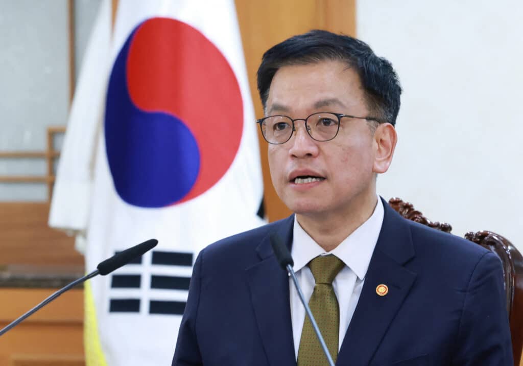 South Korea's Finance Minister and new acting president Choi Sang-mok speaks as he presides over a meeting of the National Security Council at the Government Complex in Seoul on December 27, 2024, after Prime Minister Han Duck-soo's impeachment motion was passed by the National Assembly. | Photo by YONHAP / AFP