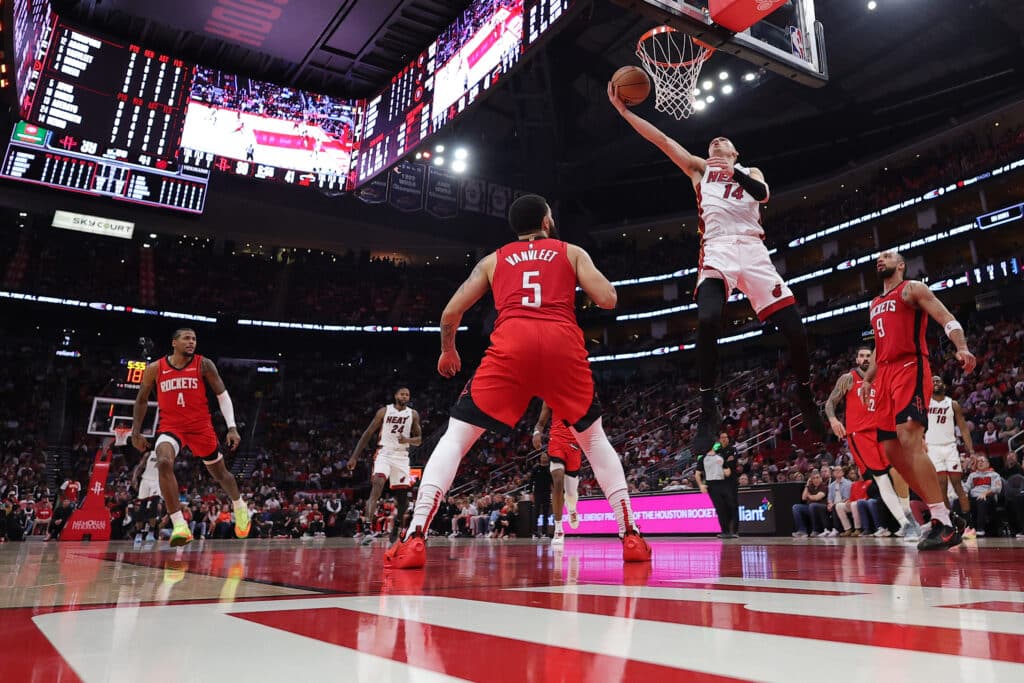 Tyler Herro #14 of the Miami Heat shoots against Fred VanVleet #5 of the Houston Rockets during the first half at Toyota Center on December 29, 2024 in Houston, Texas. | Photo by Alex Slitz/Getty Images/AFP