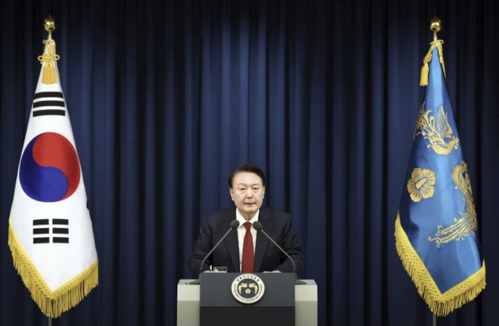 Who is the South Korean leader who tried to impose martial law?