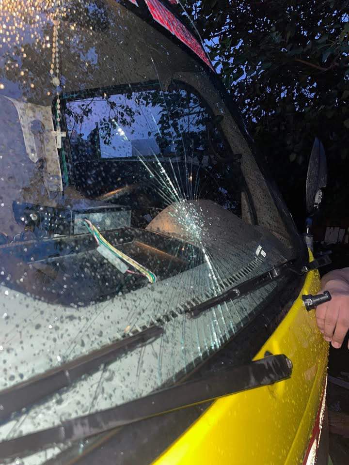 This is the damaged windshield of the fire truck attacked by at least 10 men as the fire fighters arrived with the fire truck at the fire that hit Duljo Fatima, Cebu City early this morning. | Contributed photo via Futch Anthony Inso