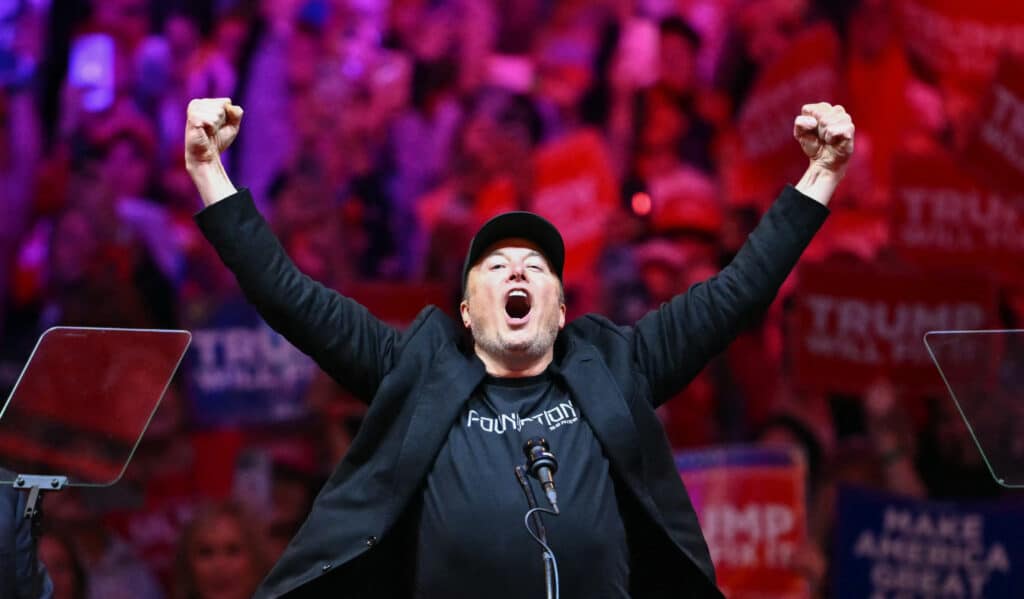 Tesla and SpaceX CEO Elon Musk gestures as he steps on stage during a rally for former US President and Republican presidential candidate Donald Trump at Madison Square Garden in New York, October 27, 2024. (Photo by ANGELA WEISS / AFP)