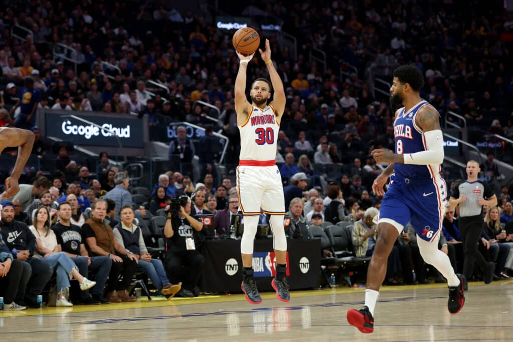 NBA: Curry scores 30 points as Warriors bury 76ers. Stephen Curry #30 of the Golden State Warriors shoots over Paul George #8 of the Philadelphia 76ers during the second half at Chase Center on January 02, 2025 in San Francisco, California.| Ezra Shaw/Getty Images/AFP