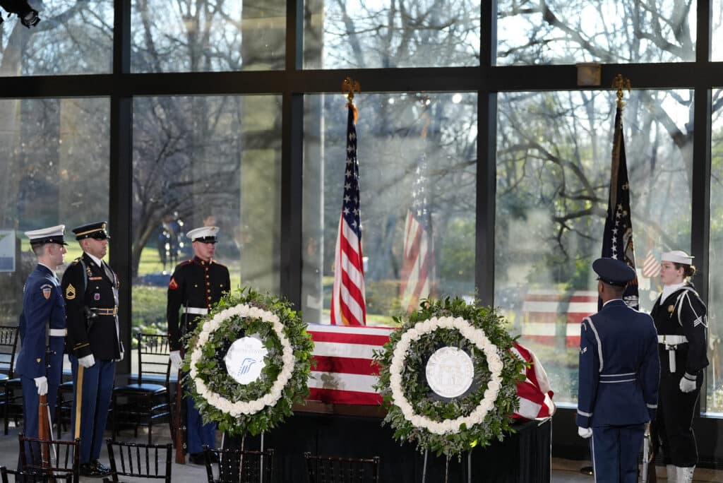 Former US president Carter: Bells toll to begin his final sendoff. The Guard of Honor stands at the flag-draped casket of former President Jimmy Carter as he lies in repose at the Jimmy Carter Presidential Library and Museum in Atlanta, Georgia, on January 4, 2025. | Photo by Alex Brandon / POOL / AFP