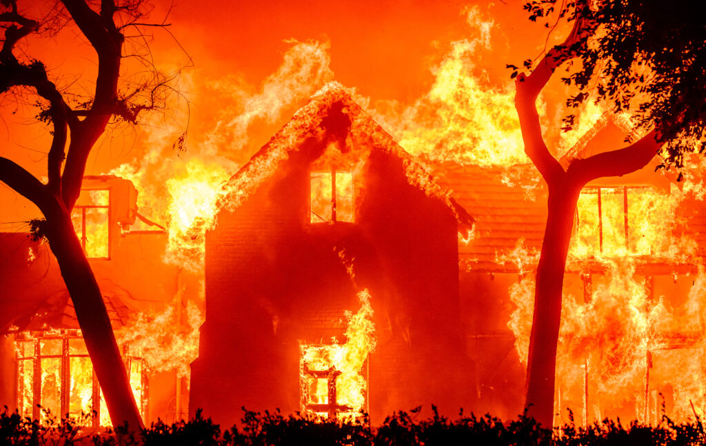 Los Angeles wildfires burn out of control, 2 dead as thousands flee. A home is engulfed in flames during the Eaton fire in the Altadena area of Los Angeles County, California on January 8, 2025. (Photo by JOSH EDELSON / AFP)