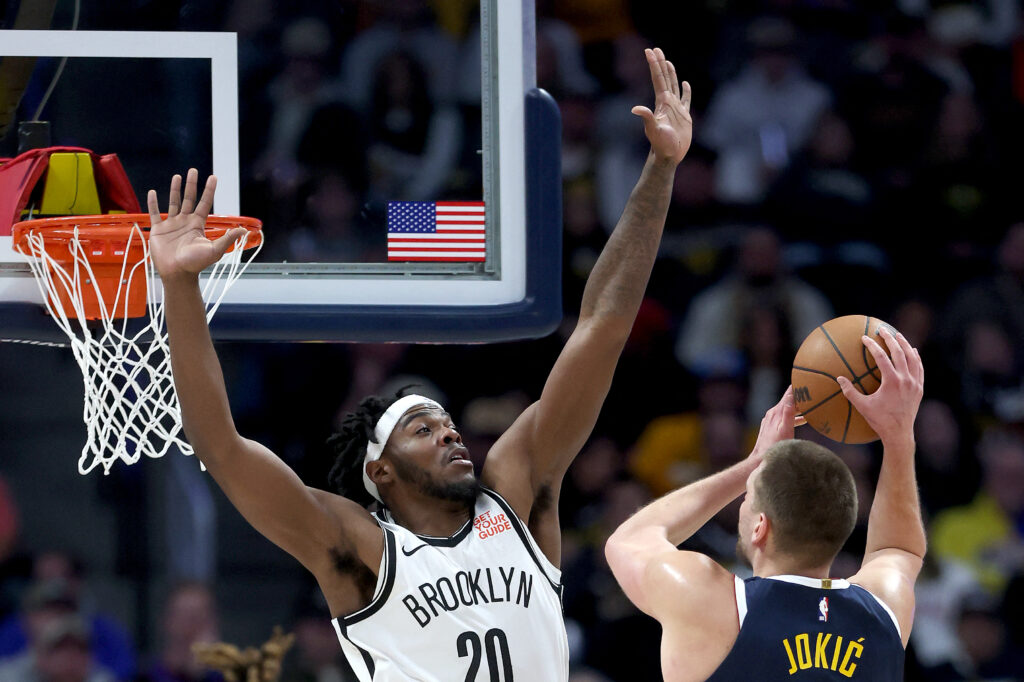 NBA: Jokic, Westbrook have triple doubles as Nuggets beat Nets. Nikola Jokic #15 of the Denver Nuggets goes to the basket against Day'Ron Sharpe #20 of the Brooklyn Nets in the first quarter at Ball Arena on January 10, 2025 in Denver, Colorado.| Matthew Stockman/Getty Images/AFP