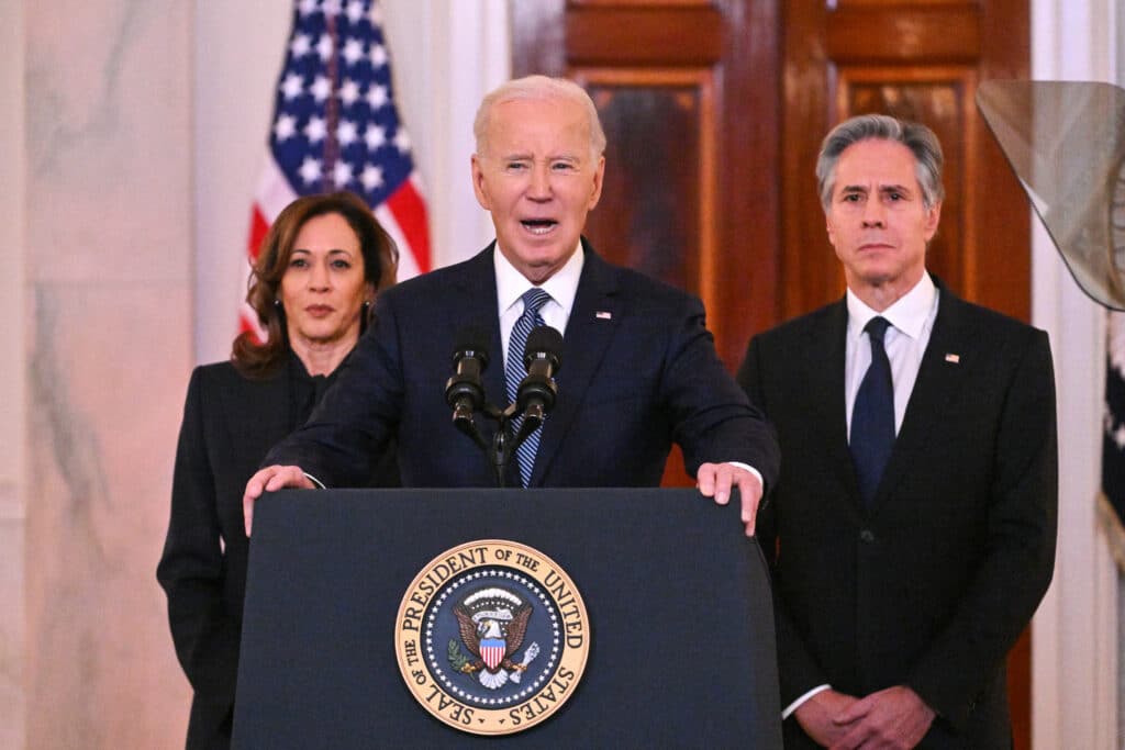 US President Joe Biden, alongside Vice President Kamala Harris (L) and Secretary of State Antony Blinken (R), speaks about the Israel-Hamas ceasefire and hostage release deal in the Grand Foyer of the White House on January 15, 2025.(Photo by ROBERTO SCHMIDT / AFP)