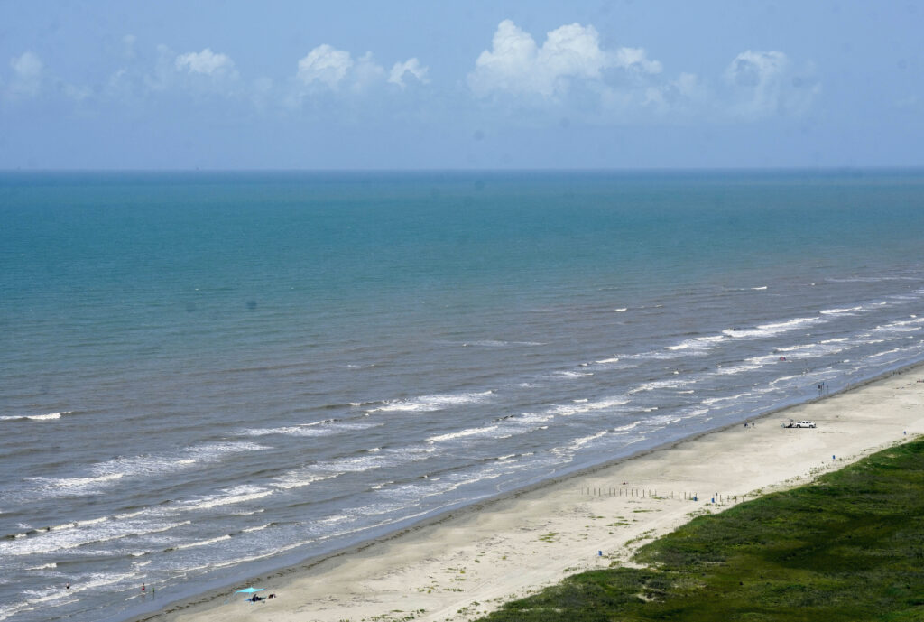 FILE - The water in the Gulf of Mexico appears bluer than usual off of East Beach, Saturday, June 24, 2023, in Galveston, Texas.  (Jill Karnicki/Houston Chronicle via AP, File)