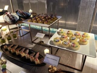 A display of colorful desserts, including Torta Cathedral and Mango Silvanas