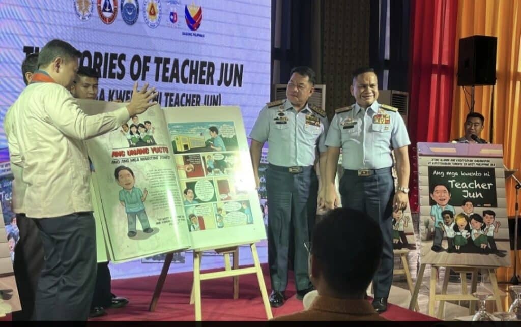 Philippine Coast Guard and national security officials launch comic books, titled "the Stories of Teacher Jun," that discuss the complex South China Sea territorial disputes in simple terms, highlights the Philippine position and criticizes China's aggressive actions, in Manila, Philippines, Friday Jan. 24, 2025. (AP Photo/Jim Gomez)