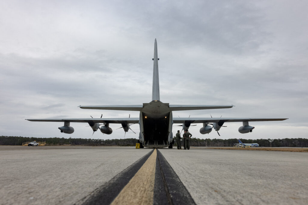 This image obtained from the US Department of Defense shows US Marines as they conduct preflight checks on a KC-130J Super Hercules at Marine Corps Air Station Cherry Point, North Carolina, on February 2, 2025, as it prepares to deploy troops to Naval Station Guantanamo Bay in Cuba to support Migrant Holding Operations. US President Donald Trump has said he wants to send 30,000 