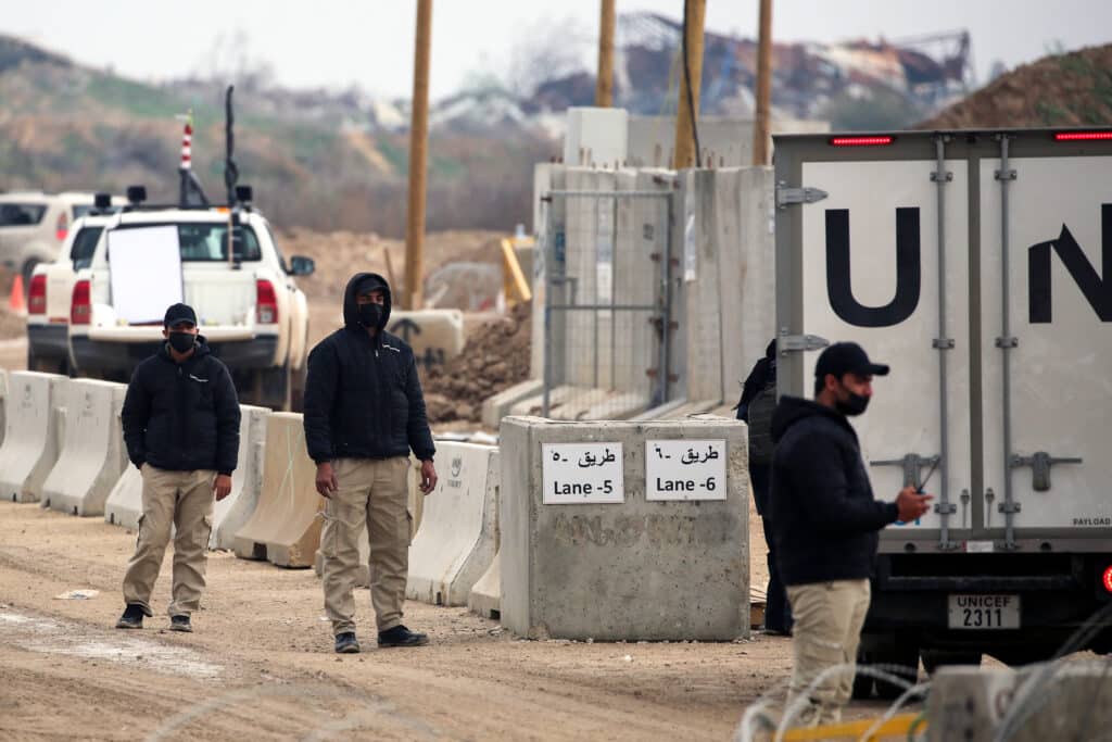 Trump warns: 'All hell' if Gaza captives not freed by Saturday. In photo are UN vehicles crossing a checkpoint manned by Egyptian and US security on Salah al-Din road in al-Mughraqa in the central Gaza Strip, on February 10, 2025, during a current ceasefire deal in the war between Israel and Hamas. (Photo by Eyad BABA / AFP)