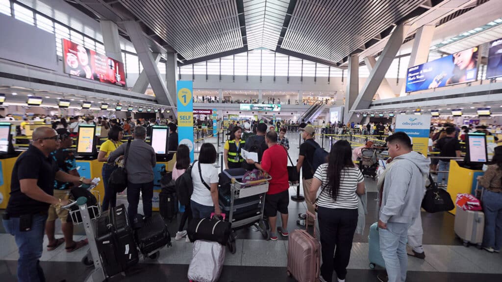 Travelers at the Ninoy Aquino International Airport.