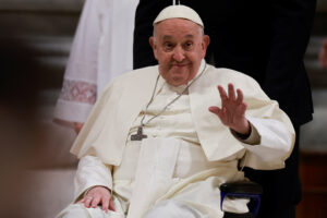 Pope Francis gestures as he leaves after the Easter Vigil in Saint Peter's Basilica at the Vatican.